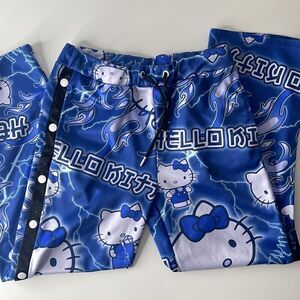 Hello Kitty Jimmy Paul sweatpants.  Size small.  Drawstring waist. Snap up legs.